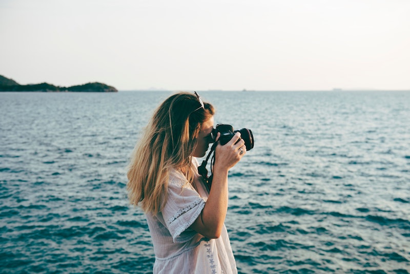 Photographer Girl on Ocean 